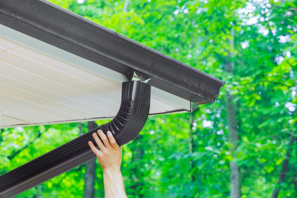 installing black gutter system
