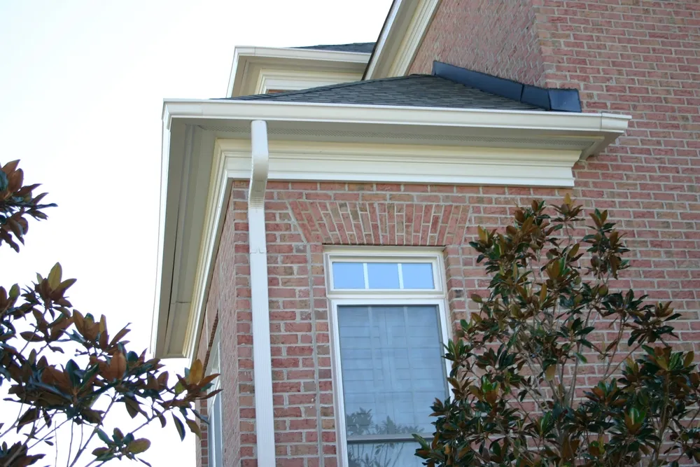 seamless gutters on brick house