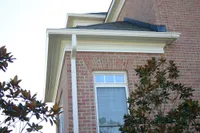 seamless gutters on brick house