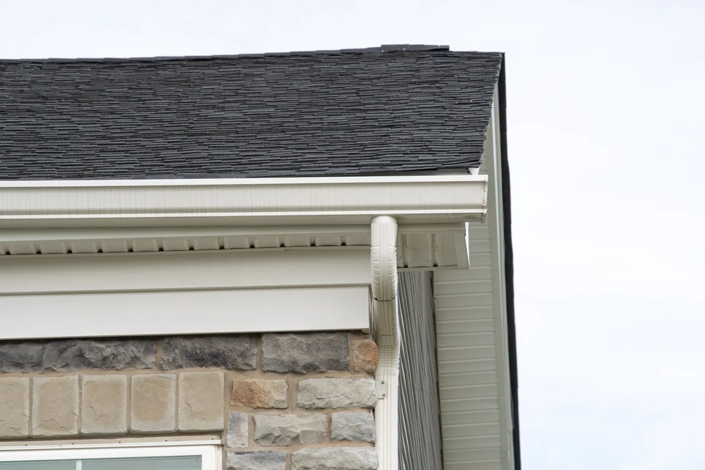 white aluminum gutters on house